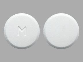 This white round pill with imprint M T7 on it has been identified as Tramadol 50 mg. . Round white pill m